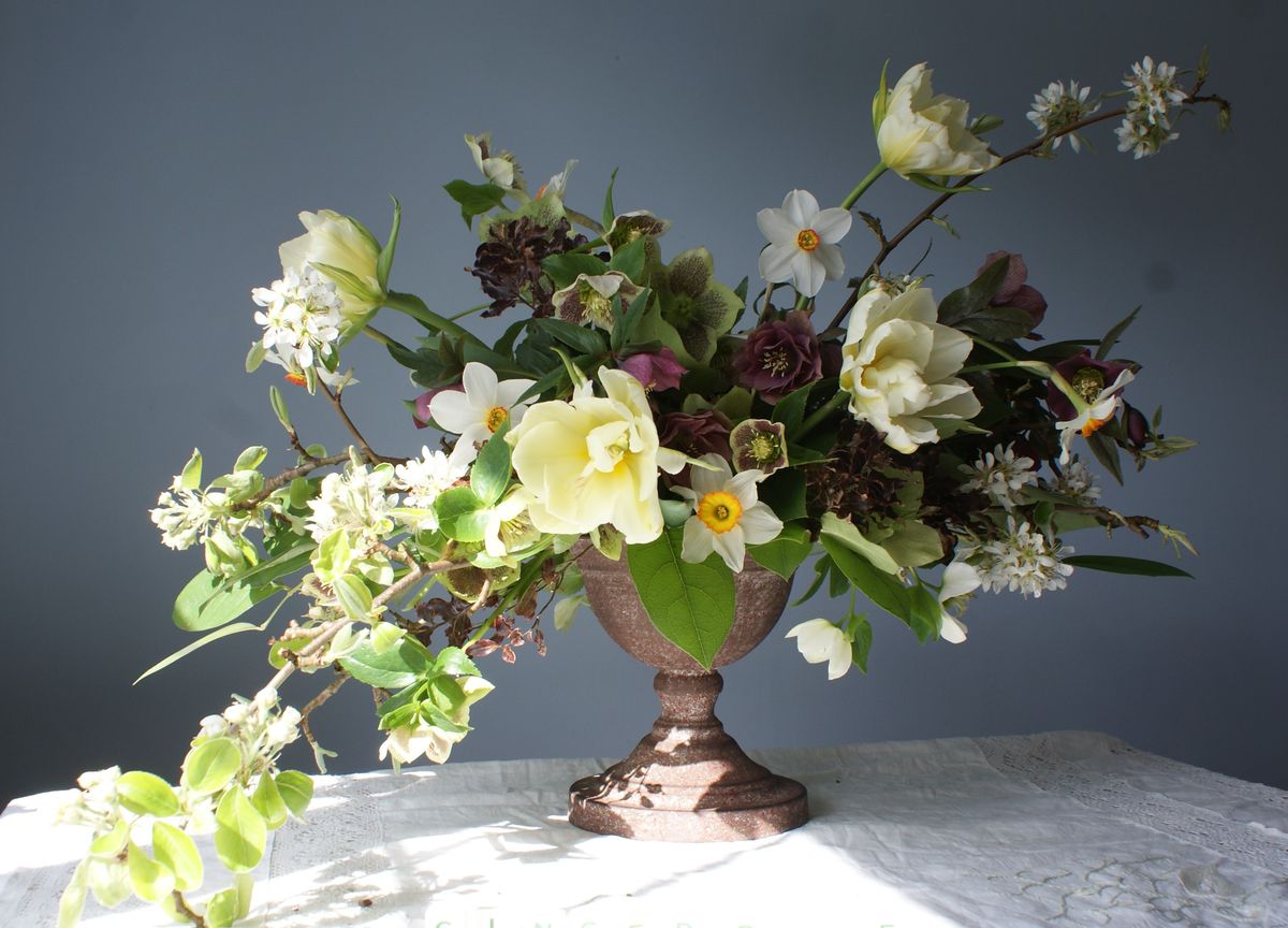Spring blossom arrangement with tulips and daffodils